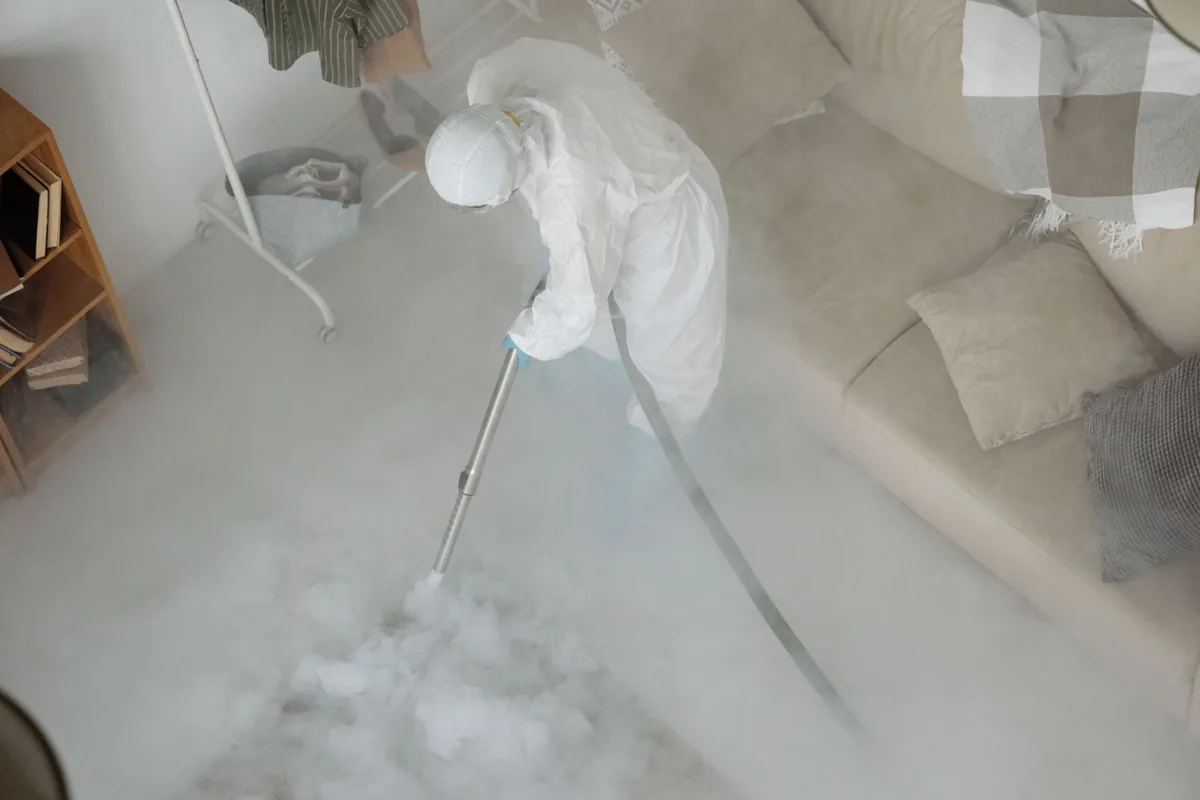 Biohazard cleanup technician in protective equipment, Alcy-Ball, Memphis, TN